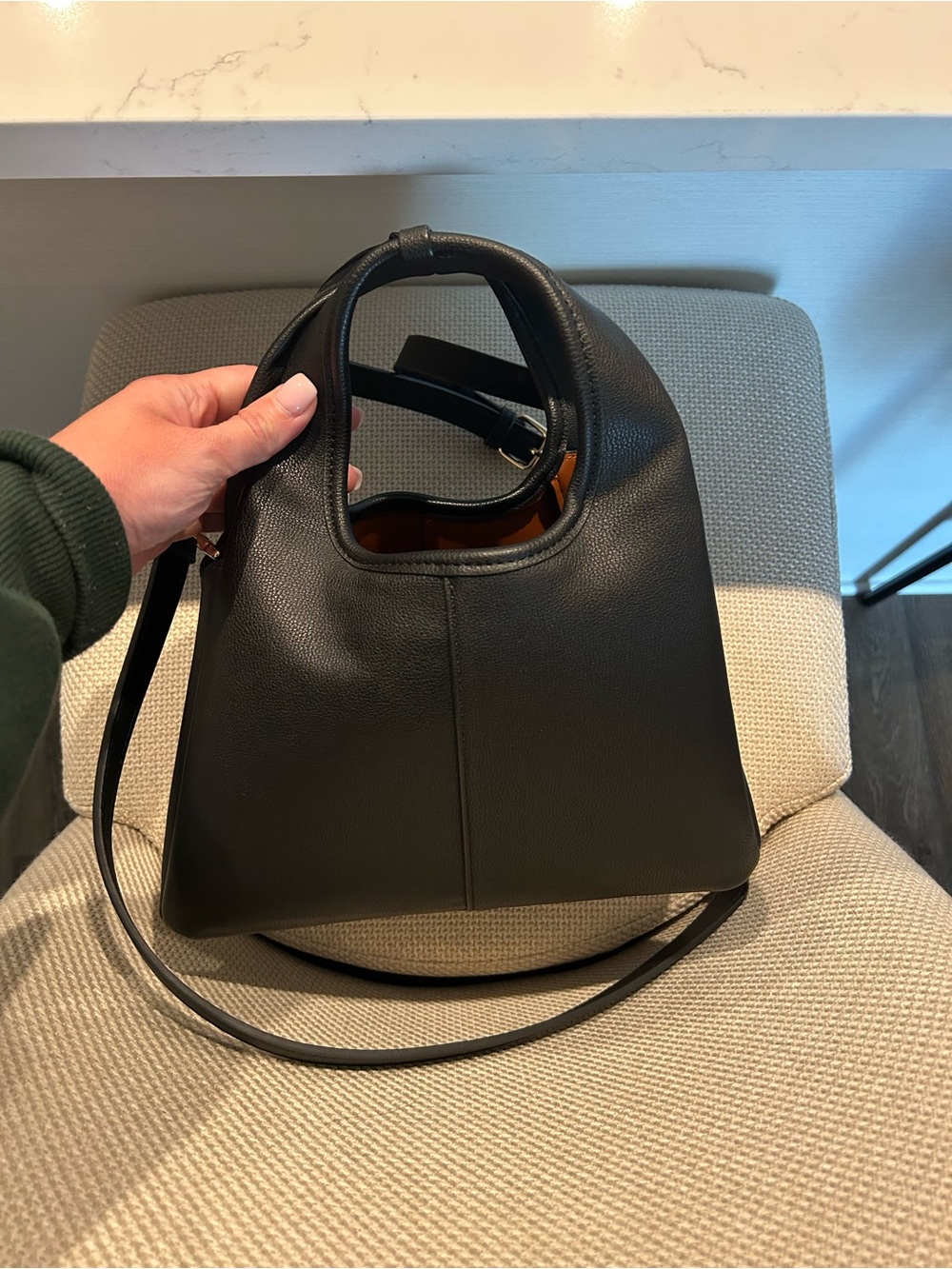Classic Black Leather Handbag with Top Handle and Strap